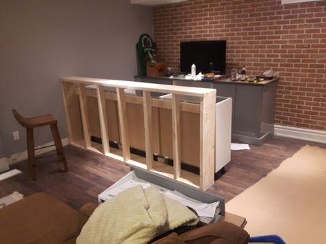 Transforming kitchen cabinets to a rustic bar 7 Basement Bar Wall Cabinets, Cabinet To Bar Diy, Bar From Kitchen Cabinets, Bar Made From Ikea Cabinets, Basement Bar Stock Cabinets, Bar Hacks Diy, Bar With Stock Cabinets, Bar From Cabinets, Building A Bar With Cabinets