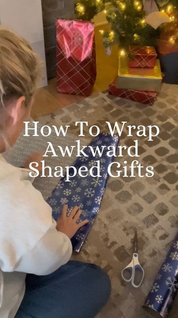 Marian Holden on Instagram: "You are essentially making a gift bag out of wrapping paper. You can customize the size depending on what you are wrapping. This works perfectly for stuffed animals and awkward shaped gifts! . . . . . . . #designerstouch #giftwrapping #giftbags #christmas #wrapping #christmasgifts #wrappingpaper" Wrapping Awkward Gifts, How To Wrap A Baseball Bat As A Gift, Making A Bag Out Of Wrapping Paper, How To Wrap Stuffed Animals, Gift Bag Out Of Wrapping Paper, Wrapping Stuffed Animals, How To Make A Bag Out Of Wrapping Paper, How To Wrap Odd Shaped Gifts, Making A Gift Bag