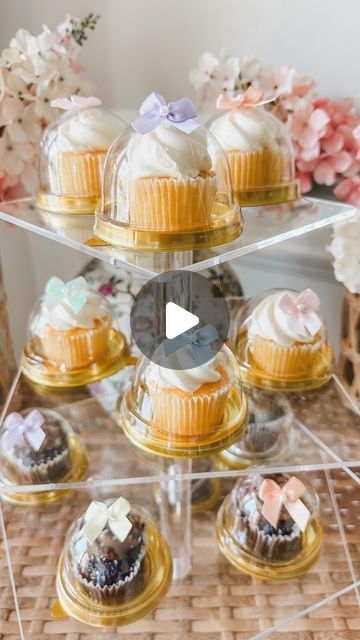 Ashley Temple on Instagram: "Comment CUPCAKE and I’ll send you the mini domes, bows, and acrylic stand! 

These mini Dome cupcakes are super cute adding the bow makes it an extra special touch. I would recommend using the smallest cupcake bites You can find. They are easy to assemble and keep your event on budget! 🎀🧁

Hi, I’m Ashley! I share tons of party favors, gift ideas, event ideas, seasonal decor, hostess tips, and tricks and all of the treasures on Amazon you didn’t know you needed. Please follow my page for more🎀🎀" Cupcake Booth Ideas, Cupcake Bridal Shower Ideas, Cupcake Bites, Hostess Tips, Small Cupcakes, Ashley I, Follow My Page, Acrylic Stand, Event Ideas