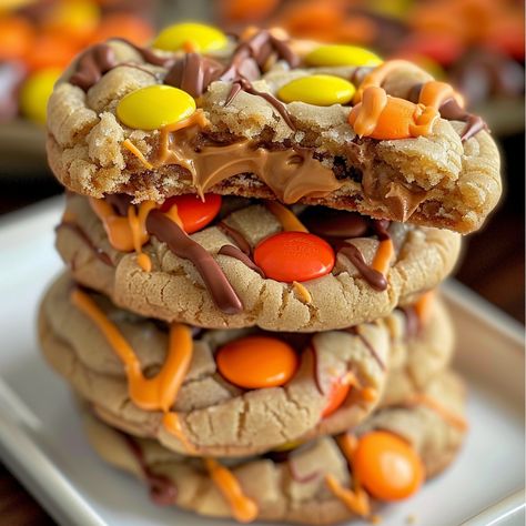 Mini Reese's Pieces Cookies Stuffed with Peanut Butter Peanut Butter Reeses Cup Cookies, Reese Stuffed Peanut Butter Cookies, Reese Peanut Butter Cookies, Reeces Cookie Recipes, Reeses Pieces Dessert Recipes, Recees Pieces Cookie, Reese Pieces Cookies, Reeses Stuffed Peanut Butter Cookies, Resses Pieces Cookies