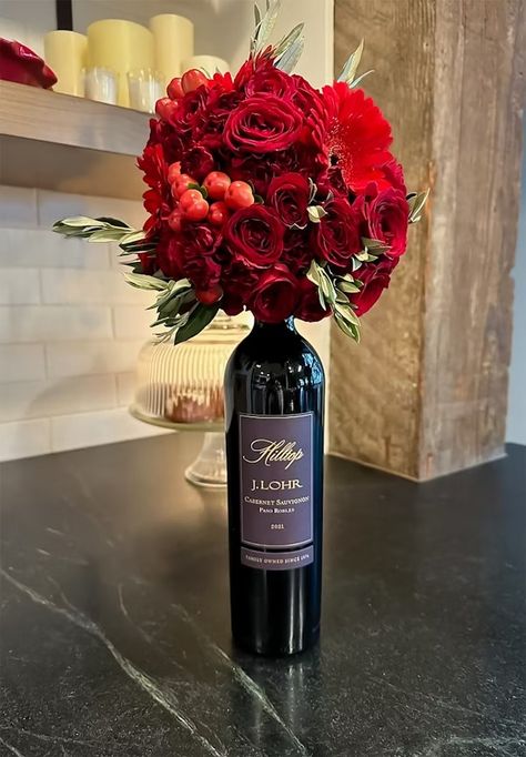 Wine Bottle Bouquet | J. Lohr Flower On Wine Bottle, Wine Bottle Bouquet Gift, Flower Wine Bottle Bouquet, Bottle Bouquet Liquor, Wine Bottle With Flowers On Top, Flower Bottle Bouquet, Wine Bottle Bouquet Diy, Wine Flower Bouquet, Flowers In Wine Bottles