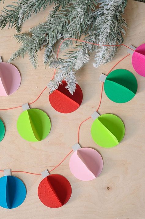 Kids will love to make make this simple DIY paper Christmas ornament garland this holiday! #ad @aleenesdiy Christmas Diy Ideas Paper, Christmas Classroom Diy Decorations, Christmas Decorations Diy For Kids Easy Paper, Christmas Tree Out Of Paper On Wall, Diy Paper Crafts Decoration Christmas, Christmas Decor Diy For Kids, Christmas Decor Ideas Diy How To Make, Cricut Christmas Garland Ideas, Kids Garland Diy