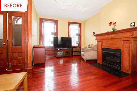 Red Wood Floors Decor, Red Cherry Floors Living Rooms, How To Decorate With Red Wood Floors, House With Cherry Wood Floors, Rooms With Cherry Wood Floors, Dark Red Floors Living Rooms, Red Floors Living Room, Bedroom With Cherry Wood Floors, Red Wood Floor Interior Design