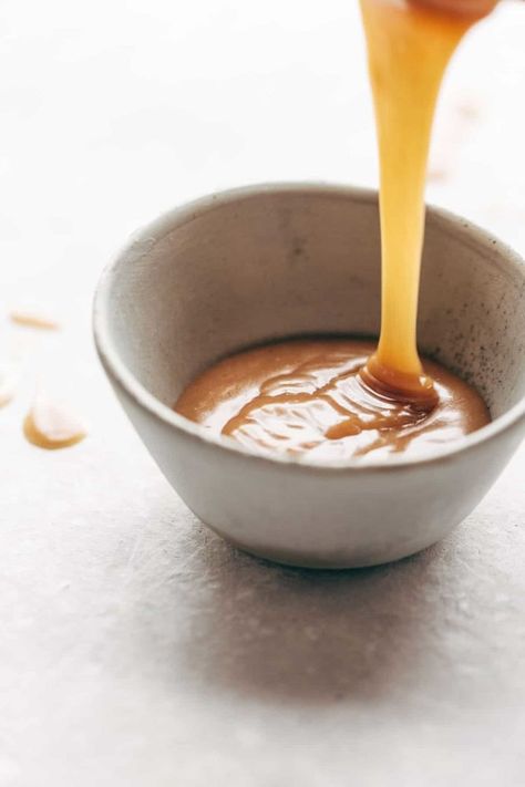 Magic Vegan Caramel Sauce made with coconut oil, real maple syrup, and almond butter. Microwave for one minute. SO GOOD! #dessert #sugarfree #vegan #sauce #dessertrecipe | pinchofyum.com Vegan Caramel Sauce, Vegan Sauce, Vegan Caramel, Coconut Almond, Decadent Cakes, Caramel Sauce, Vegan Paleo, Free Desserts, Almond Butter