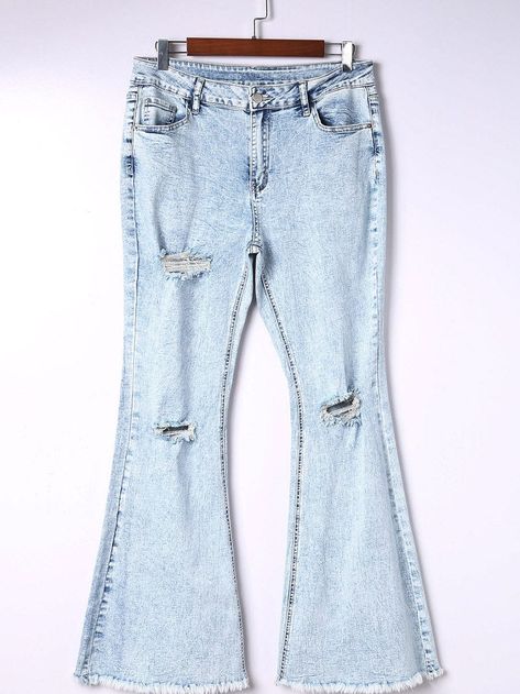 Elevate your style with our Vintage Blue Acid Wash Flared Denim Jeans. These jeans feature a stylish flared leg, a trendy acid wash finish, and cool distressed details. The light blue hue and frayed hem add a touch of vintage charm. Perfect for adding a retro vibe to any outfit!