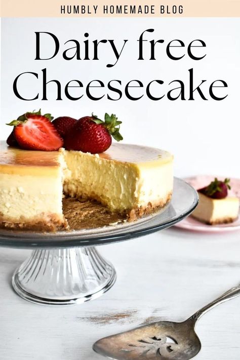 Dairy free cheesecake on a plater with a piece taken out Best Dairy Free Cheesecake, Dairy Gluten Free Cheesecake, Non Dairy Cheesecake Recipes, Lactose Desserts Dairy Free, Dairy Free Strawberry Cheesecake, Easy Dairy Free Cheesecake, No Dairy Cheesecake, Lactose Free Desserts Recipes, Lactose Free Cheesecake Recipe