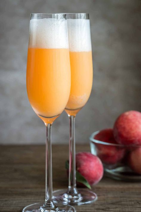 Made with fresh white peach purée and chilled Prosecco, the Bellini is a well-known cocktail that originated in Venice, Italy. #drink #recipe #cocktails Bellini, Champagne, Italy, White