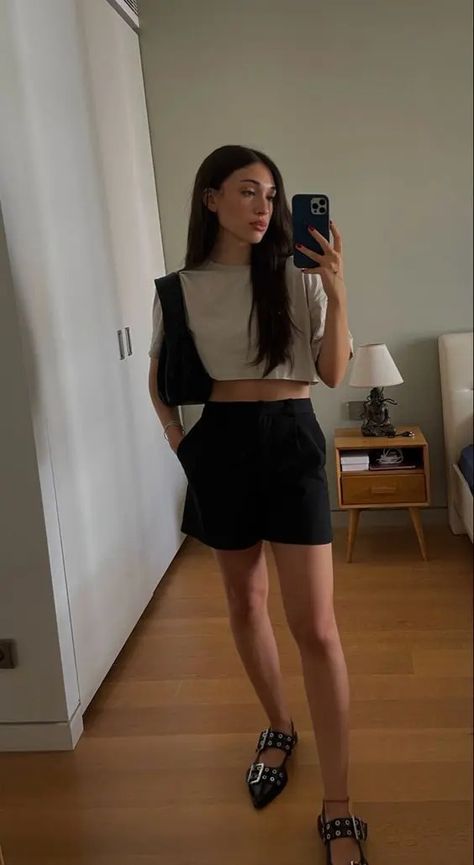 a minimal summer look with a crop tee, black cropped shorts, black studded flats and a black bag Black Sling Back Flats Outfit, Black Buckle Flats Outfit, Ganni Buckle Ballerina, Ganni Sandals Outfit, Ganni Ballerinas Outfit, Buckle Ballet Flats Outfit, Ganni Ballet Flats Outfit, Studded Ballet Flats Outfit, Black Ballerina Shoes Outfit