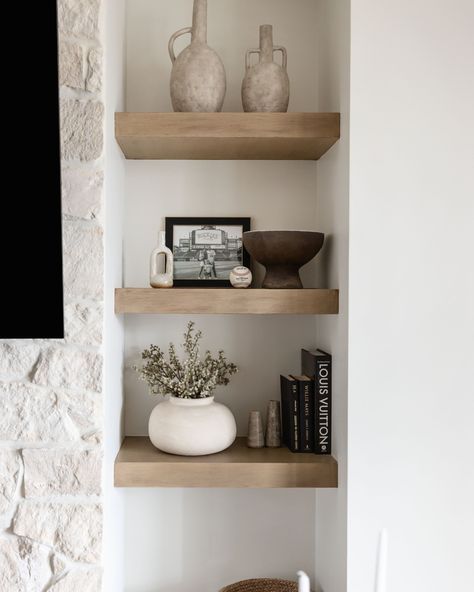 Can you tell we love a styled shelf?⁠ Display your favorite decor pieces or keep everyday essentials within easy reach. Which of these would you want in your home? ⁠ ⁠⠀⠀⠀⠀⠀⠀⠀⠀⠀⁠ 🖤 Alyssa Lane⁠ 🌷 Home Plate Hideaway⁠ 🕯️ Fairway Retreat⁠ 🧺 One Hundred Hills⁠ 🪞 Montevista ⁠ 📖 Alyssa Lane⁠ ⁠⠀⠀⠀⠀⠀⠀⠀⠀⠀⁠ Let us know your emoji pick down below! pc: @lifecreated #livingwithlolo⁠ ⠀⠀⠀⠀⠀⠀⠀⠀⠀⁠ #azdesign #arizonadesigner #scottsdaleinteriordesigner #luxeathome Small Floating Shelf Decor, Floating Shelf Styling Living Room, Shelf Decor Living Room Modern, Tv Shelf Decor, Living Room Floating Shelf Decor, Floating Shelf Decor Ideas, Minimalist Shelf Styling, Floating Shelf Decor Living Room, Minimal Shelf Decor