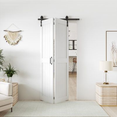 SmartStandard is committed to providing high-quality, customized, and durable barn doors to satisfy your home decoration and security needs. The introduction of Bi-fold barn door hardware represents an innovative solution to meet the demand for barn door installations in tighter spaces. Our bi-fold barn door hardware builds upon the foundation of traditional barn doors, offering space-efficient installation without compromising the unique charm of barn door aesthetics. Style: Bifold Sliding Barn Barn Sliding Doors In The House, Barnfold Door, Barn Doors For Small Spaces, Bifold Door For Bathroom, Sliding Bifold Doors, Sliding Barn Door Bedroom, Barn Door Bifold, Small Barn Door Bathroom, Bifold Sliding Doors