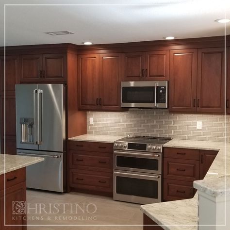 Formica Countertops With Cherry Cabinets, White Backsplash Cherry Cabinets, Small Kitchen Cherry Cabinets, White And Cherry Kitchen, Cherry Maple Kitchen Cabinets, Light Cherry Wood Kitchen Cabinets, Kitchen Design With Cherry Cabinets, Modern Cherry Wood Kitchen, Updated Kitchen With Wood Cabinets