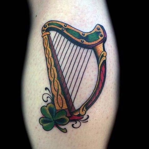 Old School Harp With Clover Irish Guys Arm Tattoo Irish Harp Tattoo, Irish Flower Tattoo, Harp Tattoo, Tato 3d, A Small Tattoo, Ireland Tattoo, Shamrock Tattoos, Celtic Cross Tattoos, Irish Tattoos