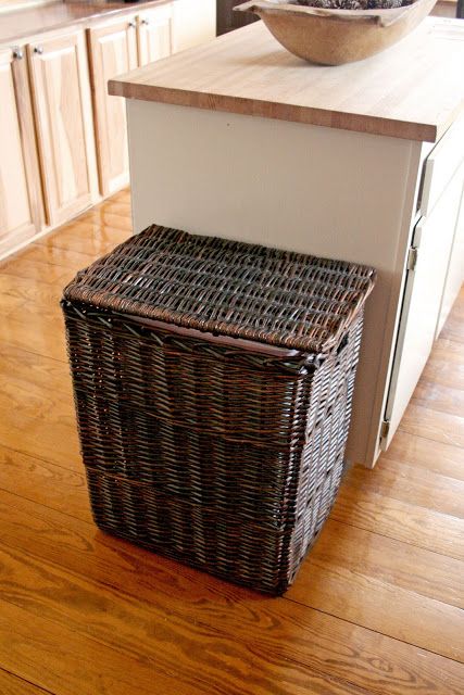 Simply drop your bin into a wicker hamper for a vessel that adds a bit more style in your kitchen. Hide Trash Cans, Garbage Can Storage, Wicker Hamper, Kitchen Design Diy, Hidden Kitchen, Dog Food Storage, Kitchen Trash Cans, Trash Bins, Garbage Can