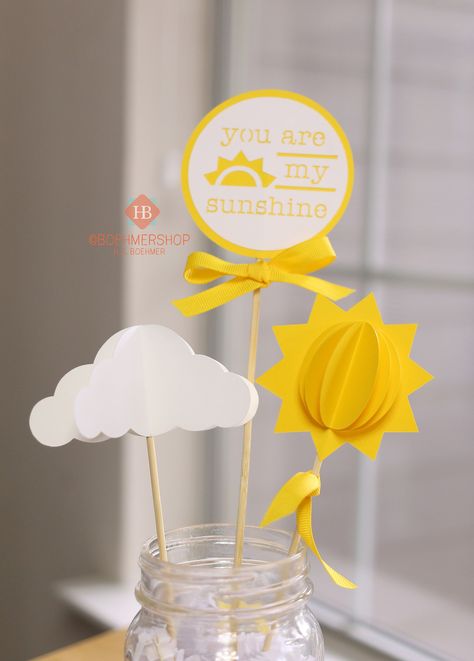 "The perfect centerpiece for your little one's birthday party or baby shower. Sunshine Centerpieces include 3 pieces in each set.  They can be added to a floral arrangement or displayed as pictured with jar filler. You can even use them as a cake topper! Displayed in 16oz (Pint) Mason Jar. JAR AND FILLER ARE NOT INCLUDED. The pieces are shipped flat and need minor \"fluffing\" when setting up for display. Find more Sunshine decorations here: https://www.etsy.com/shop/boehmershop?search_query=sun Sunshine Centerpieces, Photo Banner First Birthday, Sunshine Decorations, Sunshine First Birthday, Jar Fillers, Sunshine Baby Showers, Birthday Photo Banner, Sunshine Birthday, First Birthday Party Themes