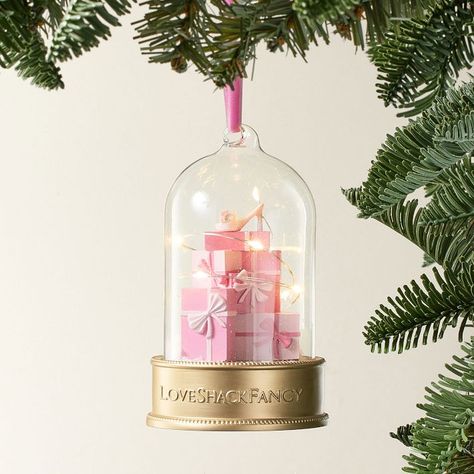 Let your pink dreams come true this holiday season with our charming cloche. Illuminated with warm lights, this handmade ornament captures a fanciful scene that adds whimsical style to your tree. Designed exclusively for Pottery Barn Teen by lifestyle brand LoveShackFancy. Made from resin and fairy lights. Features a hand painted finish. Hangs from a polyester ribbon. Imported. Barbie Christmas Ornaments, Pink Christmas Wreath, Holiday Room Decor, Fancy Christmas, Pink Christmas Ornaments, Christmas Dreaming, Christmas Apartment, Product Portfolio, Pink Xmas