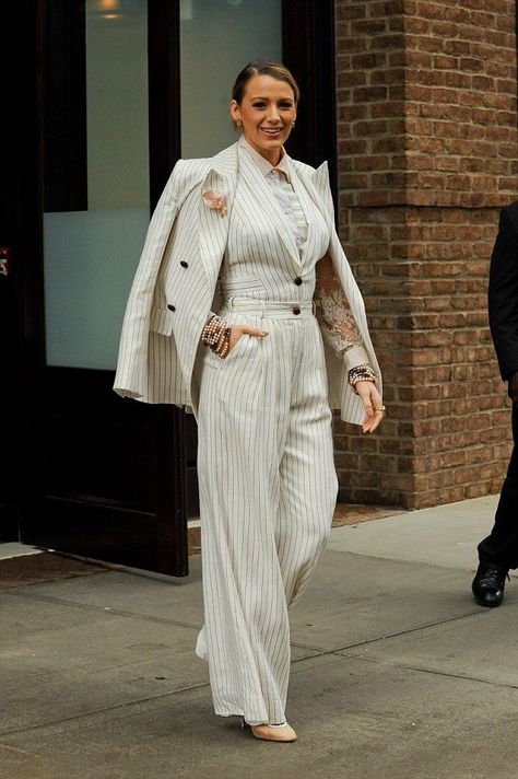 Blake Lively wears the Corsage Tailored Pant, matching vest and Corsage Blazer from our Resort 19 Ready-to-Wear Collection while out and about in New York. Blake Lively Blazer Outfit, White Pinstripe Suit Women, White Blazer Suit Women, Stripped Suit Women, White Pinstripe Blazer Outfit, Stripe Suit Woman, Pin Stripe Outfit, Long Line Blazer Outfit, Pin Stripe Suit Women