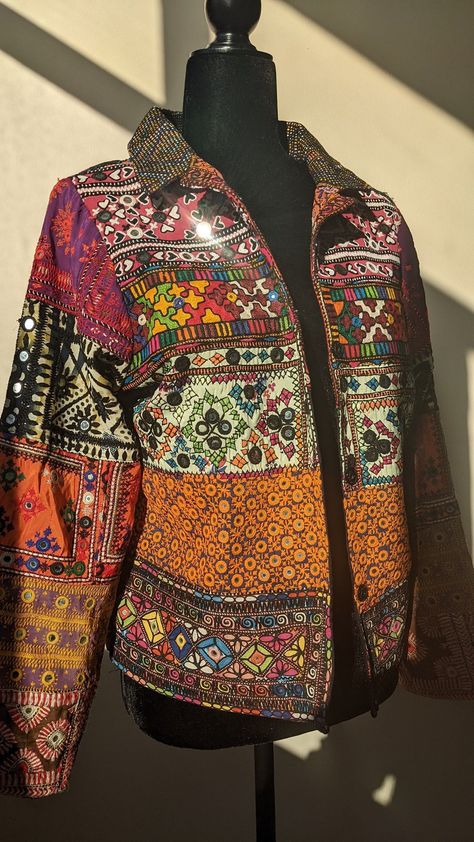 [Sponsored] This Patchwork Jacket Is Made Of Hand Embroidered Panels Stitched Together To Form A Boho Style Blazer. These Embroidered Patches Were Sourced From Tharparkar Region Of Sindh And Some Parts Of Balochistan. Each Section Of Embroidery Consists Of Different Styles Of Threadwork And Mirror Work Native To The Region, With Some Overlapping Techniques Of Baloch Styles. Some Of The Styles Of Embroidery Included Are But Not Limited To: Kaacha Taanka, #patchworkjacketsforwomen Gujrati Jackets For Women, Embroidery Jacket Design, Patch Work Lehenga, Patch Work Embroidery, Patch Work Jacket, Patchwork Jackets For Women, Embellished Jackets, Jacket Patchwork, Embroidery Jacket