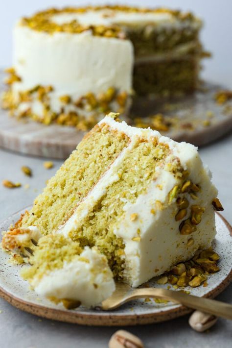 This light and airy Pistachio Cake is made from scratch, full of real pistachios, and topped with a delicious buttercream frosting. It's a classy cake that will impress your guests on any occasion! Vanilla Pistachio Cake, Pistachio Butter Cake, Homemade Pistachio Cake, Pistachio Cake From Scratch, Pistachio Cake Recipe Easy, Best Pistachio Cake Recipe, Pistachio Cake Pops, Pistachio Almond Cake, Pistachio Layer Cake