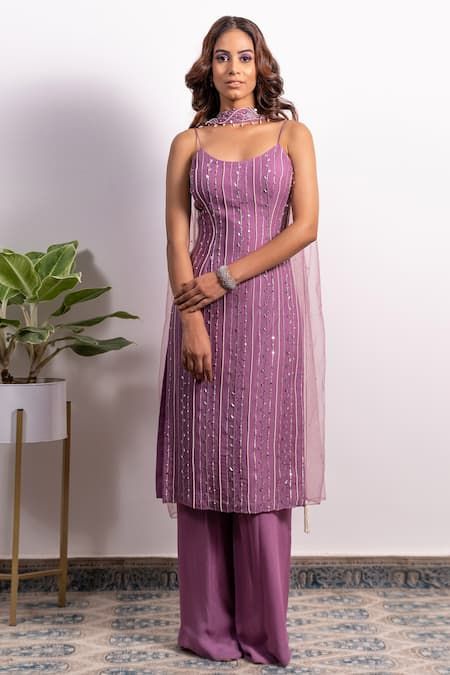 Buy Purple Georgette Embroidery Pearl Round Strappy Kurta Pant Set For Women by Silky Bindra Online at Aza Fashions. Net Straight Kurti Designs, New Kurta Set Design Women, Kurti Ideas For Wedding, Sleeveless Kurti Pants Design, Suit Piece Design Women, Embroidery Net Fabric Dresses, Sleeveless Straight Kurti Designs, Purple Ethnic Wear Women, Net Embroidery Kurti Design