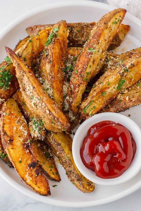 Oven Baked Potato Wedges! These roasted potato wedges are incredibly flavorful, crispy, and tender inside. Perfect as a side dish or serve as appetizers with dipping sauce. Very easy to make! Roasted Sweet Potato Wedges Oven Baked, Roasted Potatoes Wedges In Oven, Homemade Potato Wedges In Oven, Dip For Potato Wedges, Potato Wedge Recipes, Russet Potato Side Dishes, Oven Roasted Potato Wedges, Oven Wedges, Oven Baked Potato Wedges