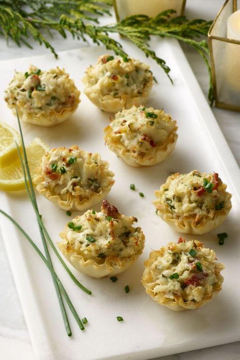 Cheesy Crab Stuffed Phyllo Cups recipe. Decadent and creamy crab filling in crispy phyllo cups. The perfect, bite-size party food for your next gathering. Philo Cups, Crab Appetizer, Tastefully Simple Recipes, Gourmet Appetizers, Phyllo Cups, Creamy Crab, Crab Stuffed, Roasted Onions, Crab Dip