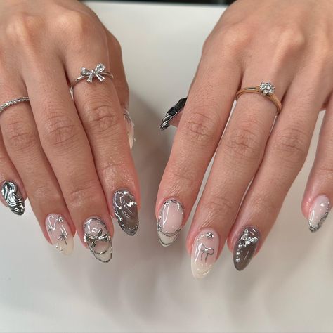 Posted by Zoe Scott: Welcome to our exploration of the chic and sophisticated world of white and silver nails, where timeless elegance meets contemporary glamour. In this ... White Silver Christmas Nails, Tokyo Nails, Concert Nails, Cheetah Print Nails, Silver Nail Designs, Kutek Disney, White And Silver Nails, Silver Nail, Grunge Nails