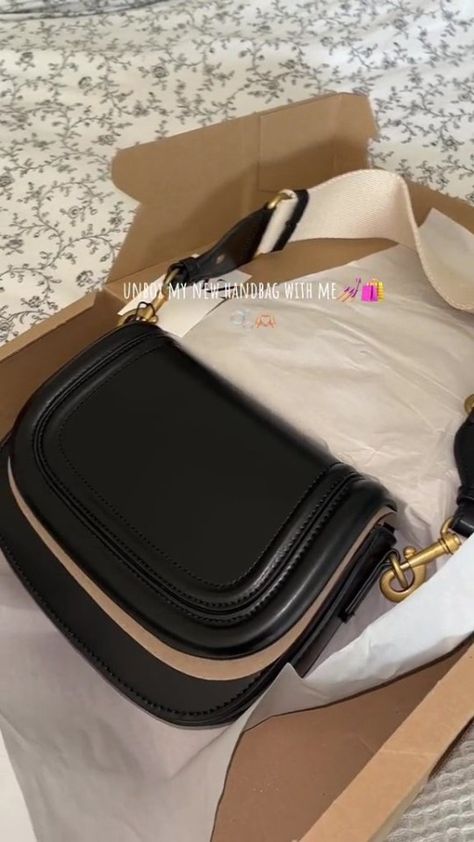 ZARA fans are in a frenzy over a stunning black handbag with a major perk. The retailer has released a gorgeous little black handbag for every occasion, which comes with one special feature. Taking to TikTok, user Eilis Marron shared a short video to the platform showing off the new find. The caption on the […] Zara Black Crossbody Bag, Zara Bags, Black Handbag, Go Wild, Going On Holiday, New Handbags, Cotton Bag, Black Handbags, Short Video