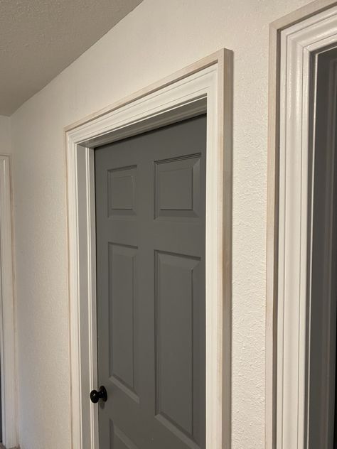 Easy Trim Update, Add To Existing Door Trim, Baseboard Door Trim, Modern Trim Around Doors, Front Door Casing Interior, Adding Trim To Door Frame, Wide Trim Around Doors, Window Frame Molding, Door Trim And Baseboard Ideas