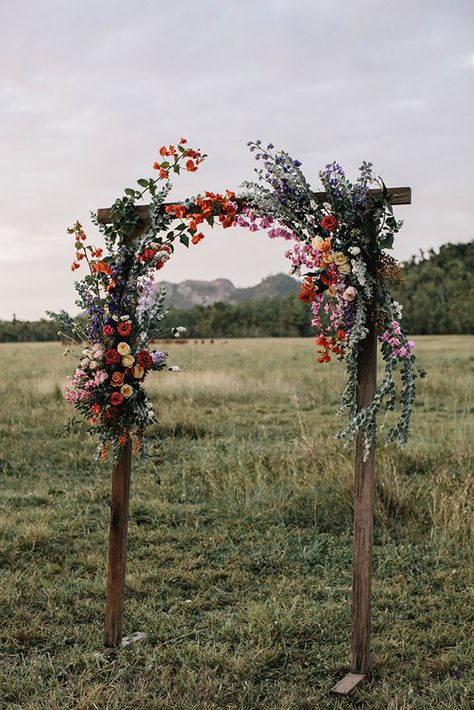 Wooden Flower Wedding Arch, Fall Boho Wedding Flowers Arch, Wedding Arch Flowers Wildflowers, Whimsical Wedding Altar, Wedding Arch With Wildflowers, Floral Arrangements Backdrop, Archway Floral Arrangement, Simple Altar Decor, Wildflower Arbor Decor