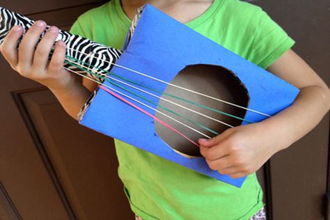 guitar craft for kids | Cardboard Guitars | Crafts for Kids | PBS Parents -- Make your own guitar (give it a electric guitar template over it; duct tape to decorate) Cardboard Guitar, Music Instruments Diy, Instrument Craft, Guitar Crafts, Homemade Musical Instruments, Making Musical Instruments, Homemade Instruments, Duct Tape Crafts, Learn Violin