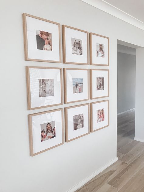 Small Wood Photo Wall, Photo Wall Wood Frames, 16x16 Picture Frame Wall, Light Wood Gallery Wall, 6 Square Frame Gallery Wall, Photo Wall In Hallway, Family Friendly Living Room Ideas, Gallery Wall Photos Family, Photo Wall Gallery Living Rooms