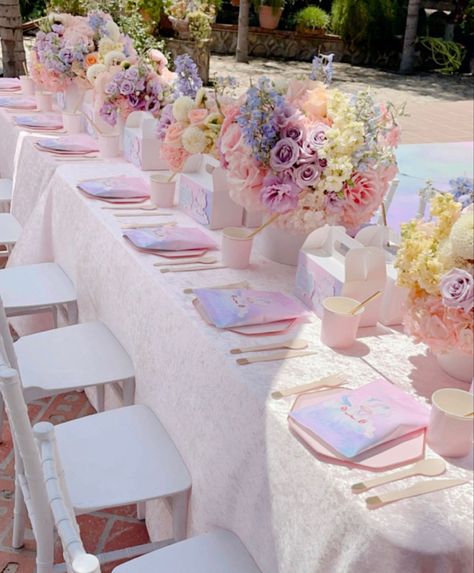 Centerpieces for a 1st birthday party Unicorn theme 🦄🌈 pastel colors Lavender, Pink, Blue, yellow, peach #centerpieces #florals #flowers Princess Party Flower Centerpieces, Pastel Colors For Birthday Party, Pink And Blue Birthday Party Theme, Flower Themed Party Table, Pink Pastel Birthday Theme, Pastel Colored Party, Pastel Flower Themed Birthday Party, Pastel Color Party Ideas, Pastel Birthday Table Setting