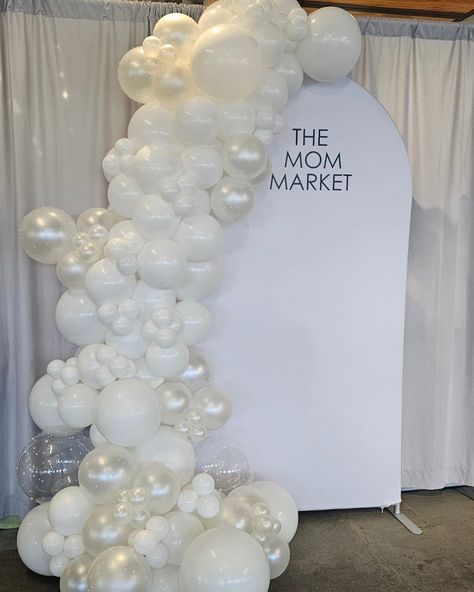 An all white display for the opening weekend of @themommarket_newfoundland #whiteballoons #pearlballoons #bargainballoons #tuftexballoons #gemarballoons #themommarket #balloondecore Winter Wonderland Balloon Decorations, White Christmas Balloon Garland, White And Pearl Balloon Garland, White Winter Balloon Garland, White Christmas Balloon Decor, Snow Balloon Arch, Monochrome Balloon Garland, Baby It’s Cold Outside Balloon Garland, Pearl White Balloon Arch