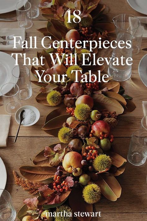 Decorate your table with anything that speaks to you: Pumpkins, gourds, nuts, flowers, candles, and other seasonal materials. Whatever you choose, all eyes will be on your fall table arrangements that perfectly mirror the bounties of the season. #marthastewart #fall #falldecor #diyideas #diydecor Table Decorations Fall Simple, Flower Centerpieces Thanksgiving, Tall Fall Centerpieces For Table, Autumn Tablescapes Centerpieces, Fall Centerpiece With Candles, Natural Fall Centerpieces For Table, Natural Fall Tablescapes, Low Fall Centerpieces For Table, Large Fall Centerpieces For Table