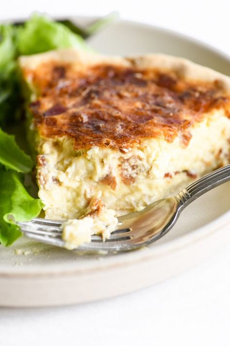 A classic quiche Lorraine made with heavy cream, milk, eggs, Gruyere cheese, bacon, shallot, and a touch of nutmeg is so silky and delicious! #quiche #french #recipe #juliachild #french Classic Quiche Lorraine, Recipe Using Milk, Classic Quiche, Heavy Cream Recipes, Dehydrated Strawberries, Quiche Lorraine Recipe, Light Lunches, Delicious Quiche, The View From Great Island