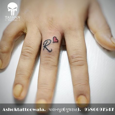 R S Tattoo Design, Letter Tattoos On Fingers, R Tattoo Letter Heart, The Letter R Tattoo, Initial Finger Tattoo Letters, R Finger Tattoo, Ring Finger Letter Tattoo, Letter R Tattoo Ideas, Name Finger Tattoo