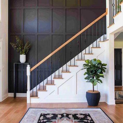 board_and_batten_accent_wall 24 Accent Wall Ideas Staircase, Black Wall On Staircase, Staircase Wall Board And Batten, Dark Accent Wall Staircase, Entry Stairs Wallpaper, Stair Wall Board And Batten, Open Staircase Accent Wall, Stairway Wall Treatments, Wall Below Stairs Decor