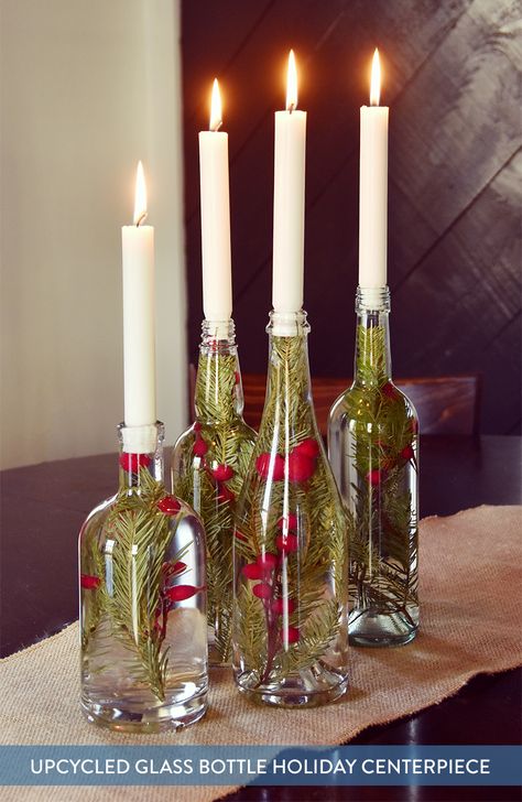 We're halfway through December, it's time to pick out a centerpiece! Try this super easy candle centerpiece that uses upcycled bottles and colorful berries. Simple Candle Centerpieces, Glass Bottle Centerpieces, Upcycled Christmas, Bottle Centerpieces, Candle Centerpiece, Easy Candles, Glass Bottle Crafts, Holiday Centerpieces, Christmas Centerpieces