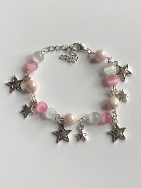 pink star charm bracelet Star Charm Bracelet, Homemade Bracelets, Barbie Inspired, Star Clothing, Diy Jewelry Unique, Pink Star, Pink Jewelry, Star Bracelet, Star Jewelry