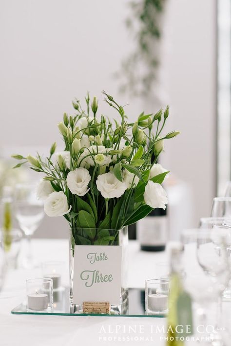 Simple elegant square vase of white lisianthus and greenery for wedding reception. Wedding Reception Simple, Lisianthus Bouquet, Affordable Wedding Flowers, Best Wedding Reception, Wedding Flowers Tulips, Country Wedding Flowers, Wedding Flowers Peonies, Romantic Wedding Flowers, Modern Wedding Flowers