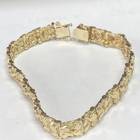 Estate 14k Yellow Gold Nugget Bracelet! Excellent Pre-owned Condition!!! Recently professionally polished, bracelet shows no visible signs of wear. Weight: 27.1g Length: 8” over all Gauge: 9.5mm wide Hallmarked: 14k All items are preowned and might show appropriate signs of age or wear. Item you see in the pictures is the actual item you are getting. lease look at the pictures carefully and use your own judgment before bidding Feel free to Ask any additional questions ALL SALES ARE FINAL NO RETURNS INSURED DOMESTIC SHIPPING ONLY Shipped with USPS First Class Package. Bracelets Gold For Men, Gold Nugget Jewelry, Custom Gold Jewelry, Dope Jewelry Accessories, Nugget Bracelet, Solid Gold Bracelet, Gold Teeth, Mens Gold Jewelry, Luxe Jewelry