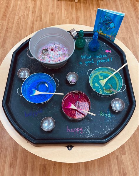 Friendship Early Years, Rainbow Fish Playdough, Science Tuff Tray Eyfs, Eyfs Rainbow Fish, Messy Play Eyfs Activities, World Book Day Tuff Tray Eyfs, Rainbow Fish Tuff Tray Ideas, Emotion Tuff Tray Ideas, Tuff Tray Book Ideas