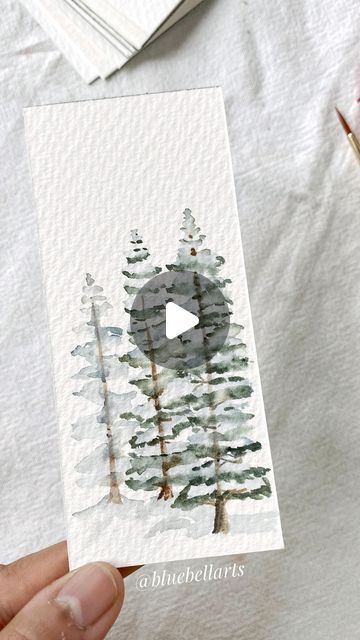 Easy Robin Painting, Easy Watercolor Pine Trees, Snowy Tree Watercolor, Pine Trees Watercolor Painting, Watercolor Art Pine Trees, Winter Water Coloring Ideas, Watercolor Snowy Trees, How To Watercolor Pine Trees, How To Paint Pine Trees In Watercolor