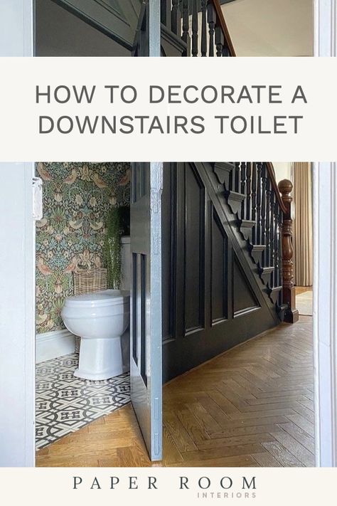 A step by step guide on how to decorate a downstairs toilet to create a practical and beautiful space for you and your guests. Tiny Powder Rooms Under Stairs, Under Stairs Toilet Wallpaper, How To Decorate Toilet Room, Scandi Downstairs Toilet, Downstairs Toilet Sloped Ceiling, Toilet Under Stairs Ideas Small Spaces, Under Stairs Cloakroom Ideas, Cloakroom Toilet Floor Tiles, Tiny Understairs Toilet