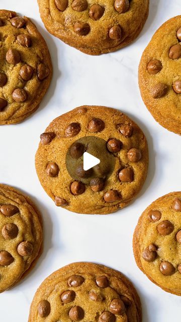 Angelika | Baking + Recipes on Instagram: "Caramel stuffed cookies - Soft and chewy chocolate chip cookies with a gooey caramel centre 🍪 I made these cookies using brown butter as it adds a subtle yet gorgeous nutty flavour! ❤️

Ingredients:
-125g salted butter
-120g caster sugar
-60g light brown sugar 
-1x egg (room temperature)
-2 tsp vanilla extract 
-200g plain flour
-1 tsp baking soda
-Caramel chocolate (I used @cadburyaust Caramello)
-Dark or milk chocolate chips (measure with ❤️)

Method:
-Add butter to a saucepan and melt over low/medium heat, stirring consistently. The butter will start to foam, keep stirring until the butter turns a golden brown/amber colour. Once you achieve this colour, carefully transfer the butter into a heat safe dish and let cool for 10-15 minutes. 
-In a Caramel Stuffed Cookies, Stuffed Cookies, Gooey Caramel, Cookies Soft, Chewy Chocolate Chip, Caramel Chocolate, Chewy Chocolate Chip Cookies, Chocolate Caramels, Caster Sugar