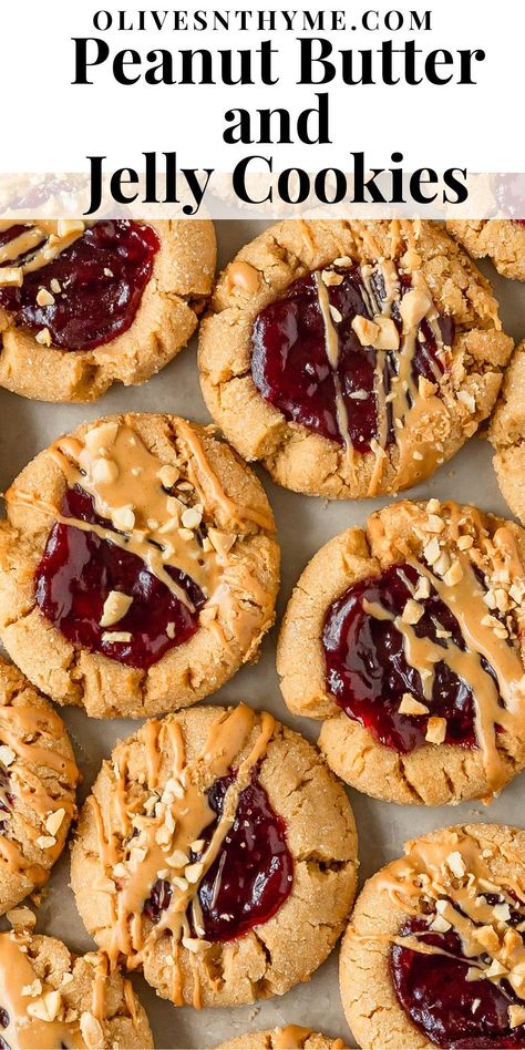 Peanut butter and jelly cookies are soft and chewy peanut butter cookies, rolled in a crunchy sugar coating, with a strawberry jam filled center. Top these easy to make peanut butter jelly cookies with a dollop of more jelly, a drizzle of PB and chopped peanuts after baking. These pb and j cookies are just like the classic sandwich in cookie form. Peanut Butter Cookie Topping, Peanut Butter Frosting Cookies, Fruit Crumble Cookies, Peanut Butter And Jelly Brownies, Pb Jelly Cookies, Ways To Eat Cookie Butter, Cute Pb&j Sandwiches, Peanut Butter And Jelly Cookies Recipes, Award Winning Peanut Butter Cookies