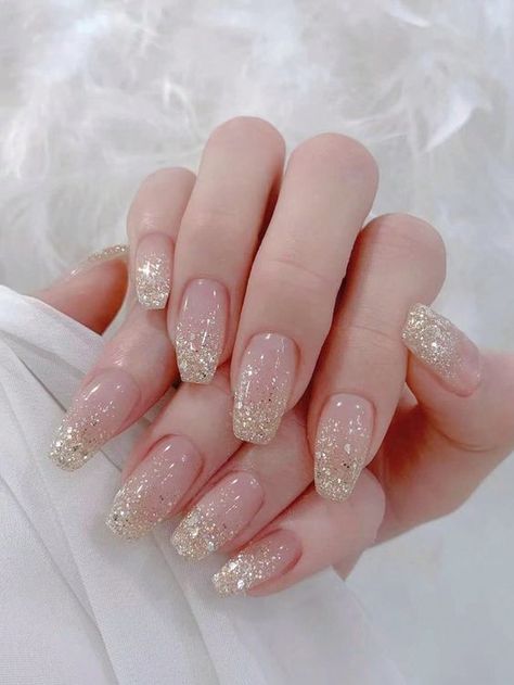 Choose from a vareity of wedding nail ideas to add touch of beauty and elevate your bridal look! Pink Bridesmaids Nails, Clear Nails With Gold Glitter, Beige And Rose Gold Nails, Gold And Glitter Nails, Nails Acrylic For Wedding, Rose Gold Wedding Nails, Nails For Wedding Bridesmaid, Champaign Nails, Sparkly Nude Nails