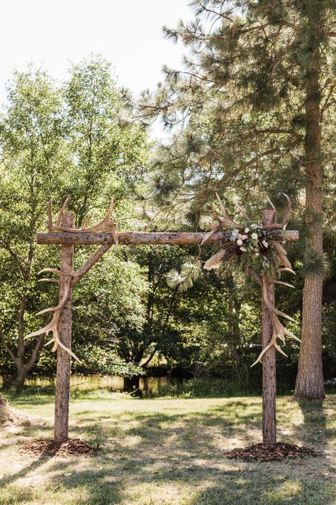 DIY, homemade western wedding arch with elk sheds, floral arrangement with pheasant feather accents. Photography by Rhiannon Mim, WA wedding photographer Wedding Arches With Antlers, Deer Horn Wedding Arch, Wedding Arch With Deer Antlers, Outside Western Wedding Reception, Wedding With Pheasant Feathers, Wedding Bouquets With Antlers, Rustic Hunting Wedding Decor, Outdoor Cowboy Wedding, Wedding Arch Ideas Western