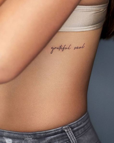 Tiny Tattoos On Ribs, Women Ribs Tattoo Ideas, Soul Quotes Tattoo, Strength Rib Tattoo, Tattoo In Ribs Women, Birthday Tatoos Ideas For Women, Beautiful Soul Tattoo Words, Rib Saying Tattoos For Women, Rib Tattoo Font