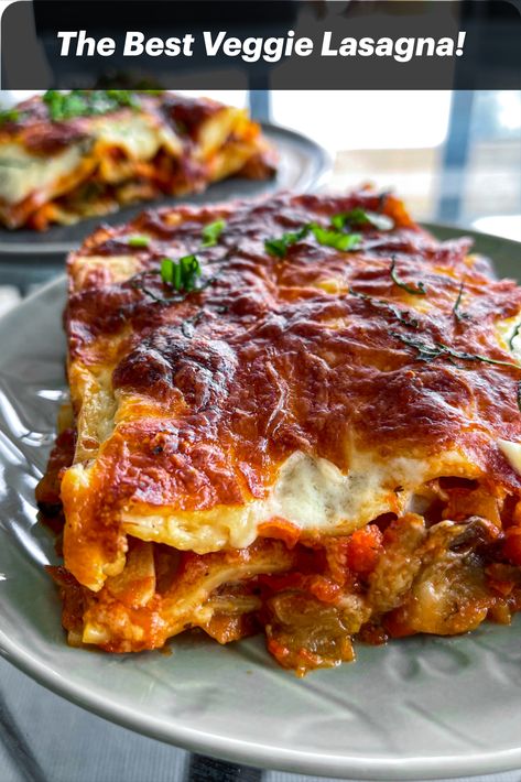 This delicious vegetarian lasagna is loaded with roasted peppers, courgette and aubergine, a tasty homemade tomato sauce and a cheesy béchamel, all baked to perfection. This hearty, comforting dish is sure to please even the most avid of meat-eaters! Don’t take my word for it – try it! Garlic Roasted Asparagus, Vegetable Lasagna Recipe, Lasagna Dinner, Roasted Vegetable Lasagna, Vegetarian Lasagne, Vegetable Lasagne, Vegetarian Bowls, Beautiful Recipes, Veggie Lasagna